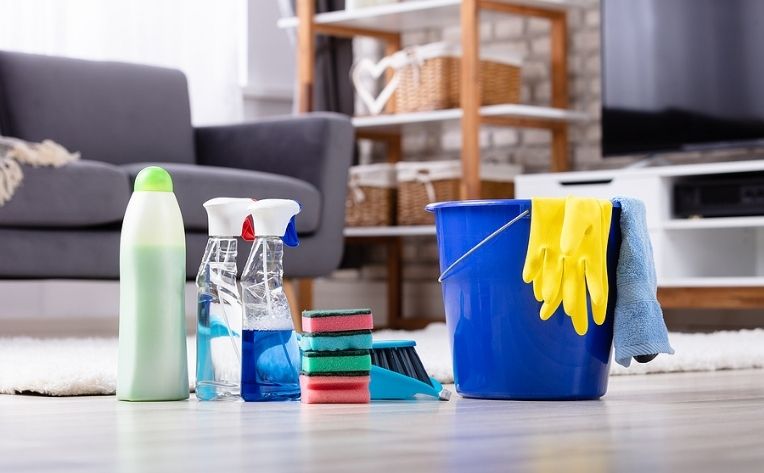 Cleaning Supplies on Hardwood Floor